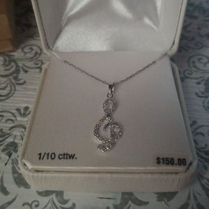 Treble cleft necklace